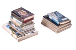 A group of assorted books including mountaineering.