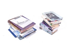 A collection of naval related books.