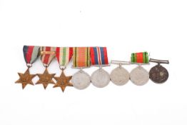Eight WWII unmarked medals.