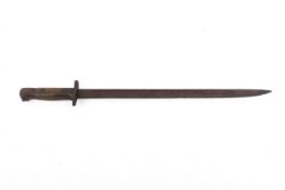 A WWI bayonet. With a wooden handle, blade length 43cm.