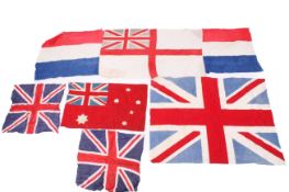 A group of assorted British and Commonwealth flags.