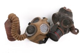 Two 20th century gas masks.