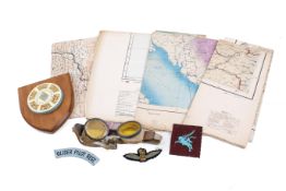 A group of WWII glider pilot items and maps.