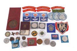 An assortment of 20th century international militaria and collectables.