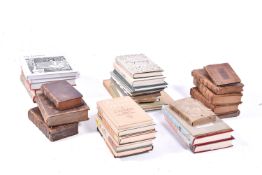 A collection of assorted antiquarian and later books.