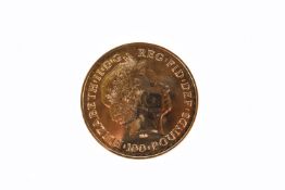 A 2013 Elizabeth II gold 1oz Britannia coin. In a delux display case.