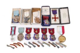 An assortment of Masonic medals and badges.