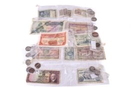 A small collection of WWII Middle Eastern coins and bank notes.