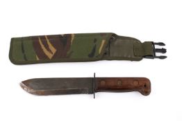 A circa 1980s British military survival knife.