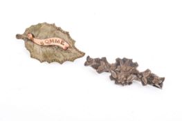 A Victorian silver bar brooch and a WWI sweetheart brooch.