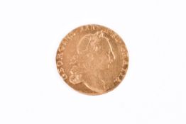 A 1764 George III gold Guinea coin, rare, probably ex mount. Weight 8.