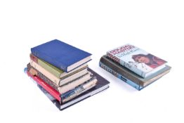 A collection of assorted books mostly related to mountaineering.