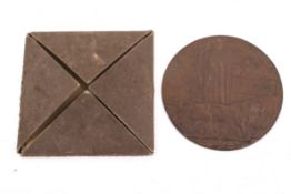 A bronze 'Death Plaque' awarded to Albert James Bradley.