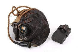 A WWII RAF C-Type pilot’s flying helmet and a German Third Reich electric torch.