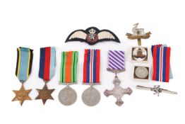 A WWII medal group and an assortment of collectables.