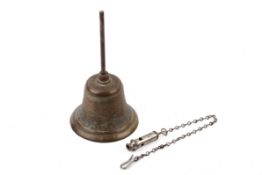 A WWII air raid brass bell and a whistle. Both marked A.R.P.