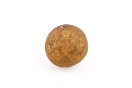 A ballista shot or cannonball fashioned from stone. Diameter 4.