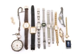 A small group of wristwatches and a pocket watch.