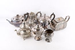 A collection of assorted silver plated items. Including tea pots, etc.