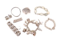 A small group of silver jewellery including a Georg Jensen pendant.