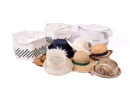 A collection of assorted women's mostly formal summer hats, retailed by John Lewis.