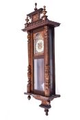 Vienna walnut cased wall clock.