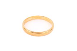 An 22ct gold wedding band. Width circa 3mm, hallmarked, size P, weight 2.9g.