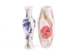 Two modern circa 2009 Moorcroft vases. Including 'Harvest Poppy' and 'Bluebell Harmony'.