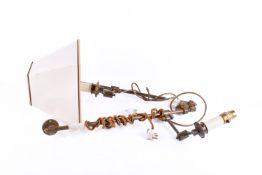 A pair of contemporary brass swing arm wall lights. Having candlestick type fittings.