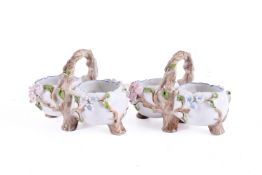 A pair of Dresden style porcelian table salt cellars.