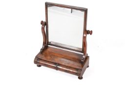 A 19th century mahogany dressing table mirror with two drawers.