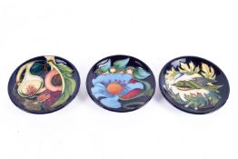 Three circa 2000's modern Moorcroft pin dishes.