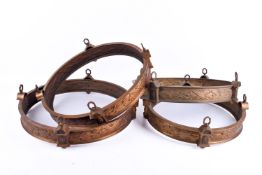 Three Art Deco bronze finish circular light fittings having cast relief laurel leaf band and one
