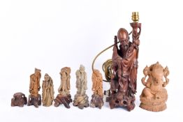 Chinese carved hardwood tablelamp and other oriental figures.