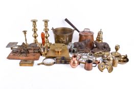 Collection of assorted vintage brassware items. Including letter scales, candlesticks, etc.