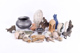 A collection of assorted antiquated pottery and metal items. Including figures, bowls, etc.