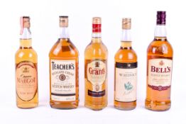Five bottles of assorted Scotch whisky.