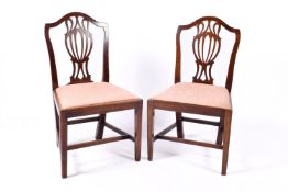 A pair of Chippendale revival mahogany dining chairs.