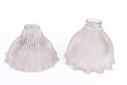 Two frilled edge pressed glass light shades, one by Holophane.