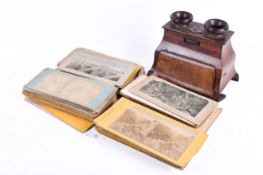 A Victorian stereoscopic '3D' card viewer and a quantity of cards. (AF).
