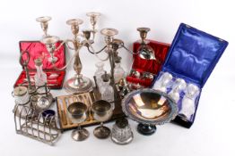 Collection of assorted silver plate items. Including candelabra, cruet sets, cased sets, etc.