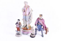A group of four assorted figures.
