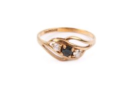 A 9ct gold and cubic zirconia ring.
