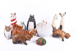 A collection of assorted ornamental cats.