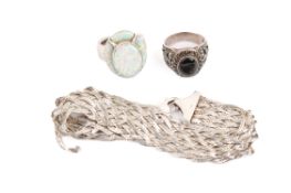 Three pieces of silver jewellery.