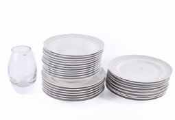 A quantity of Alfoldi porcelain dinner plates and bowls. Largest diameter 24.