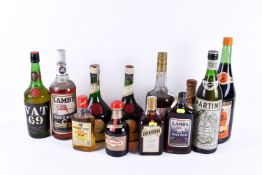 Twelve bottles of assorted spirits including Drambuie,