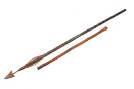 A vintage Japanese bamboo walking stick and an African spear (AF).