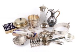 A collection of assorted silver plated items. Including a claret jug, etc.
