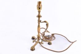 A late Victorian Art Nouveau brass Pullman style table lamp with handle.